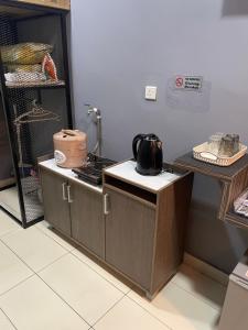 Kuchyň nebo kuchyňský kout v ubytování Cosy Residence