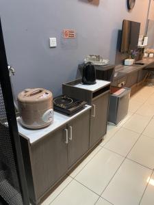 Kuchyň nebo kuchyňský kout v ubytování Cosy Residence + 16 fotografií