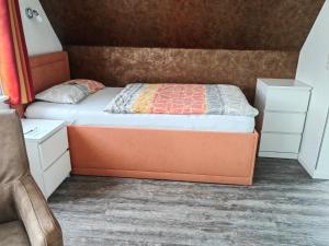 Postel nebo postele na pokoji v ubytování Gästehaus Arkona