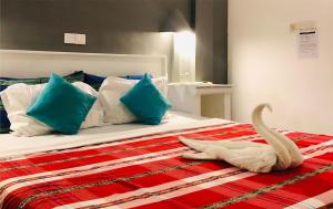 Ένα ή περισσότερα κρεβάτια σε δωμάτιο στο Hotel Vibration