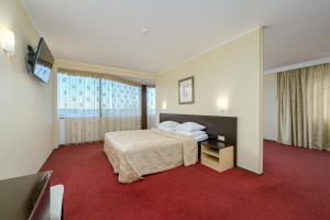 Postel nebo postele na pokoji v ubytování Hotel Rocca al Mare