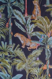 a wallpaper with jaguars in the jungle at Kyriad Cannes - Mandelieu in Cannes