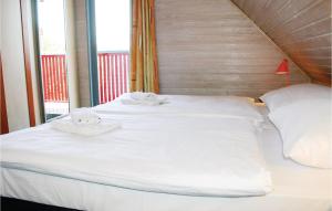 Ein Bett oder Betten in einem Zimmer der Unterkunft Ferienhaus 120 In Kirchheim