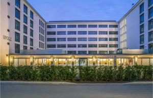 a large building with lights in front of it at Penthouse Cloud in Binz