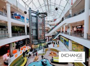 an overhead view of a shopping mall with people at 371 Cranbrook Rd IG2 in Ilford