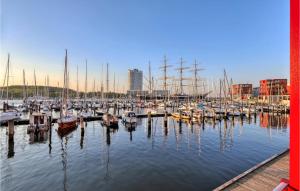 a bunch of boats docked in a harbor at Passatvilla - Apartment 2 in Travemünde