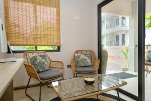 Area soggiorno di Anse Boudin Chalets