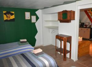 Letto o letti in una camera di LE VERT NOMADE