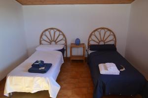 Postel nebo postele na pokoji v ubytování Bedda Casa Al Mare