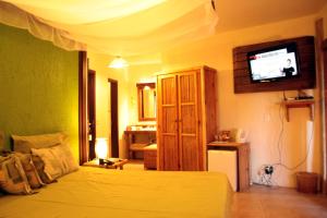 Ліжко або ліжка в номері Bangalore Suites