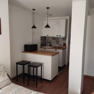 Kuchyňa alebo kuchynka v ubytovaní New Condominio Royal