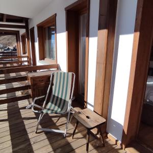 Posedenie v ubytovaní New Condominio Royal