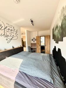 Katil atau katil-katil dalam bilik di Apartment MaLu in Weimar