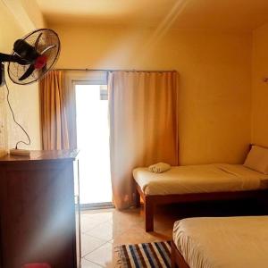 Postel nebo postele na pokoji v ubytování Golden Europe Hotel