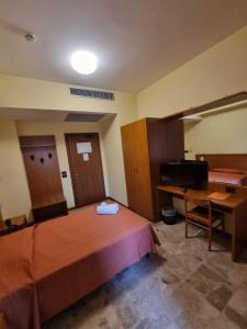 Postel nebo postele na pokoji v ubytování Aba Hotel