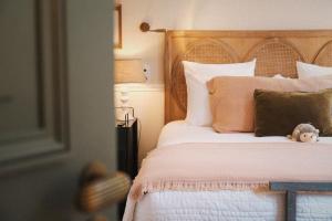 Un ou plusieurs lits dans un hébergement de l'établissement Boutique Hotel SOCLO