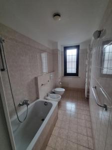 Koupelna v ubytování Aba Hotel + 23 fotografií