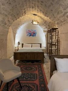 Postel nebo postele na pokoji v ubytování Sarmaşık Otel + 36 fotografií