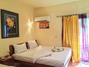 Postel nebo postele na pokoji v ubytování Golden Europe Hotel