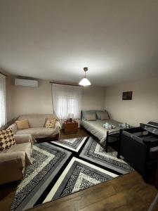 Postel nebo postele na pokoji v ubytování Platanos Village Home