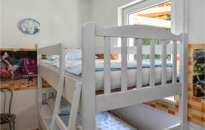 Posteľ alebo postele v izbe v ubytovaní Nice Home In Postira With Wifi