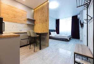 Postel nebo postele na pokoji v ubytování Nyvky Like Home - Manchattan City - Квартира 290-1