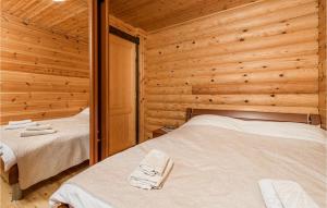 Posteľ alebo postele v izbe v ubytovaní Amazing Home In Ravna Gora With Sauna