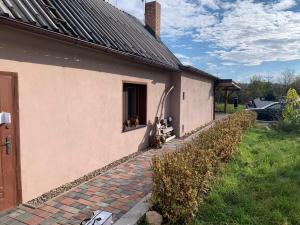 Budova, kde se prázdninový dům nachází + 3 fotografie