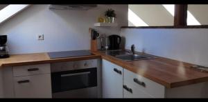 Kuchyň nebo kuchyňský kout v ubytování Gemütlich Obergeschoss Wohnung
