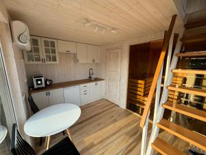 Kuchyň nebo kuchyňský kout v ubytování Kadaksalu with sauna hinnas