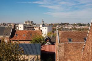 Nespecifikovaný výhled na destinaci Saint-Quentin nebo výhled na město při pohledu z apartmánu