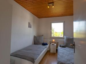 Ένα ή περισσότερα κρεβάτια σε δωμάτιο στο Bookandstay24 Rossdorf bei Darmstadt, Frankfurt, Rhein Main Gebiet