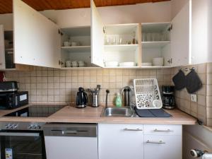 Η κουζίνα ή μικρή κουζίνα στο Bookandstay24 Rossdorf bei Darmstadt, Frankfurt, Rhein Main Gebiet +8 φωτογραφίες