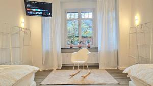 Postel nebo postele na pokoji v ubytování 122qm-Apartment - 4 Zimmer I Zentral I Küche I Balkon I Parken I WLAN + 8 fotografií