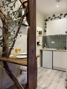 Η κουζίνα ή μικρή κουζίνα στο Love Appart'