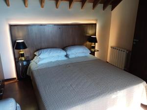 Postel nebo postele na pokoji v ubytování Casa 3