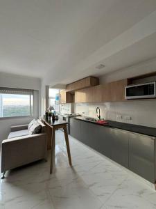 Η κουζίνα ή μικρή κουζίνα στο Alquiler Temporario Necochea