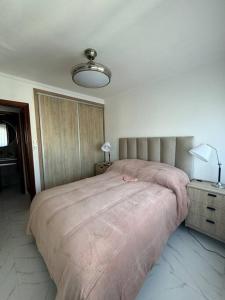 Ένα ή περισσότερα κρεβάτια σε δωμάτιο στο Alquiler Temporario Necochea