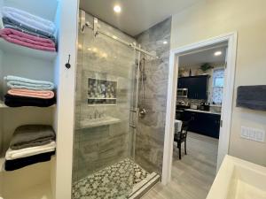 a bathroom with a shower and a sink at New York City Private Bedroom Near The Free Ferry Boat! in Stapleton