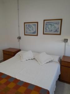 Postel nebo postele na pokoji v ubytování Alquiler temporario Rufino
