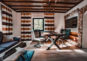 Μια τηλεόραση ή/και κέντρο ψυχαγωγίας στο Ferienhaus Einöd - Urlaub auf der Sonnenseite des Ybbstals