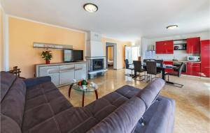 Kuchyň nebo kuchyňský kout v ubytování Holiday Home Betiga Betiga