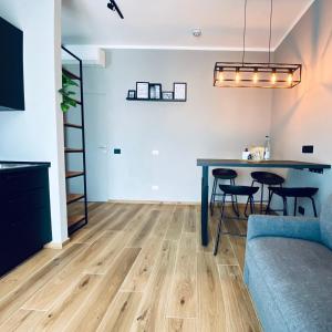 Posezení v ubytování M4 BLACK Monolocale Moderno e Funzionale