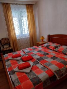 Postel nebo postele na pokoji v ubytování Rent a rooms - "Laki"