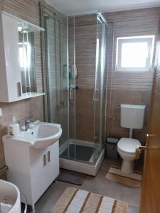 Koupelna v ubytování Rent a rooms - "Laki"