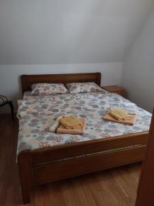 Postel nebo postele na pokoji v ubytování Rent a rooms - "Laki"