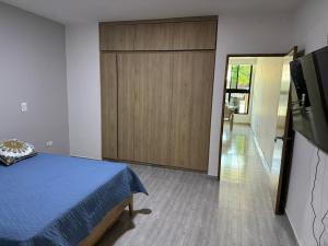 TV a/nebo společenská místnost v ubytování ApartaHotel Los Naranjos