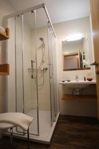 Koupelna v ubytování Hotel Käferhube + 37 fotografií