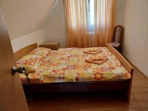 Postel nebo postele na pokoji v ubytování Rent a rooms - "Laki"