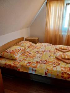 Postel nebo postele na pokoji v ubytování Rent a rooms - "Laki"